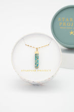 Load image into Gallery viewer, 14k gold plated stainless steel and natural turquoise pendant on a 14k dainty gold plated stainless steel chain in Starfish Project Box