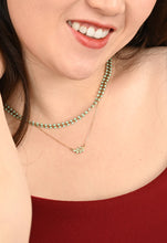 Load image into Gallery viewer, Minimalist dainty gold-plated necklace with small mint green leaf pendant