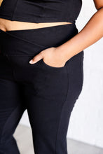 Load image into Gallery viewer, Building Habits Twill Flared Crossover Waist Pant in Black