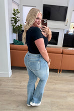 Load image into Gallery viewer, Caroline Mid Rise Control Top Distressed Flare Jeans
