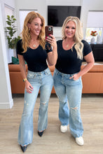 Load image into Gallery viewer, Caroline Mid Rise Control Top Distressed Flare Jeans